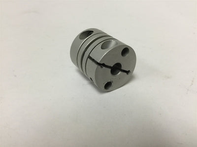 Used Shaft Coupling, Inside Dia: 5mm to 5mm, Outside Dia: 19mm, Length: 19.7mm