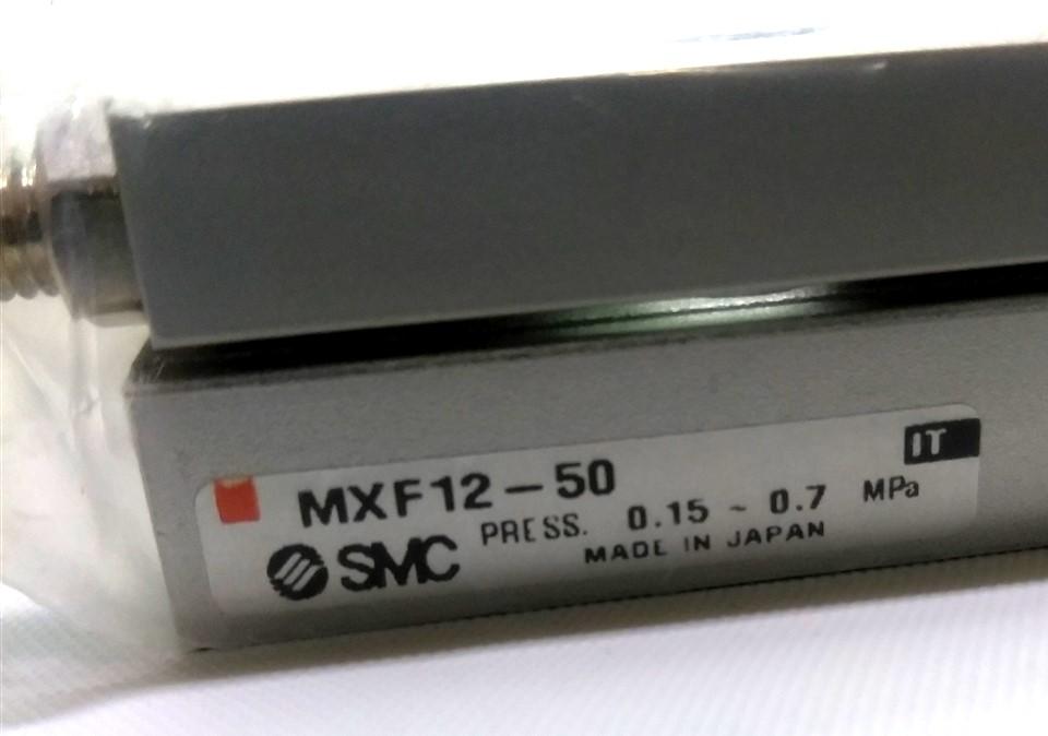 New SMC MXF12-50 Low Profile Slide Table, 50mm Stroke, 12mm Bore, 22 - 102 PSI