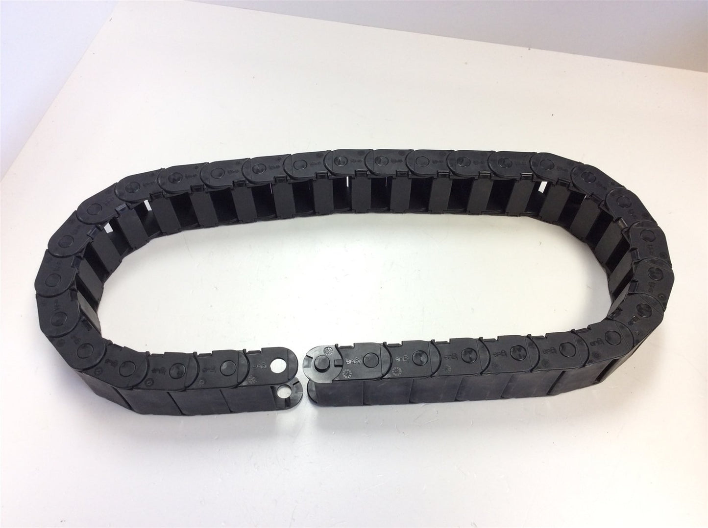 Used Igus 14.3.075 Energy E-Chain Cable Carrier ID: 1.50"W 0.80"H 37"L Bend: 4.75"