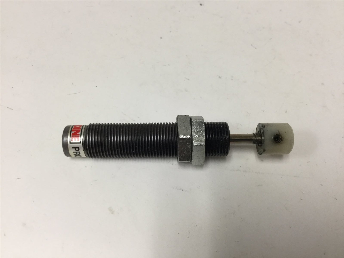Used Enidine PRO 15 IF-3B Shock Absorber, Barrel: 7/16-28 UNEF Thread, Stroke: 0.4"