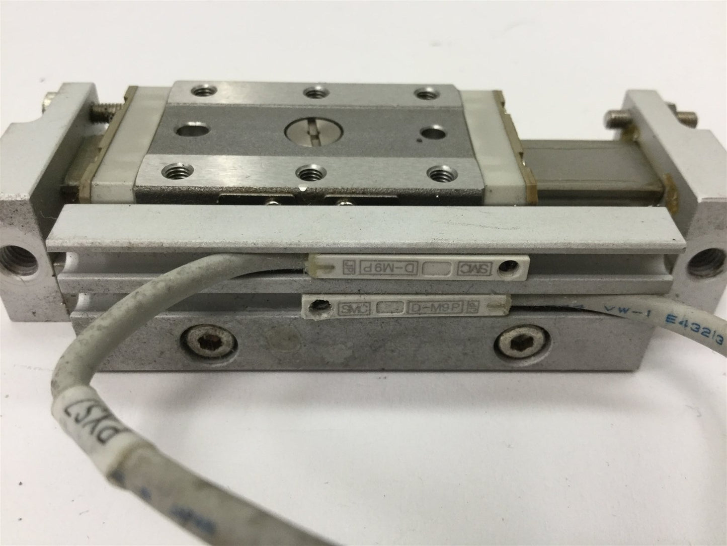 Used SMC MXP10-20 Pneumatic Slide Table, Stroke: 20mm, Bore: 10mm, 2x D-M9P Sensors