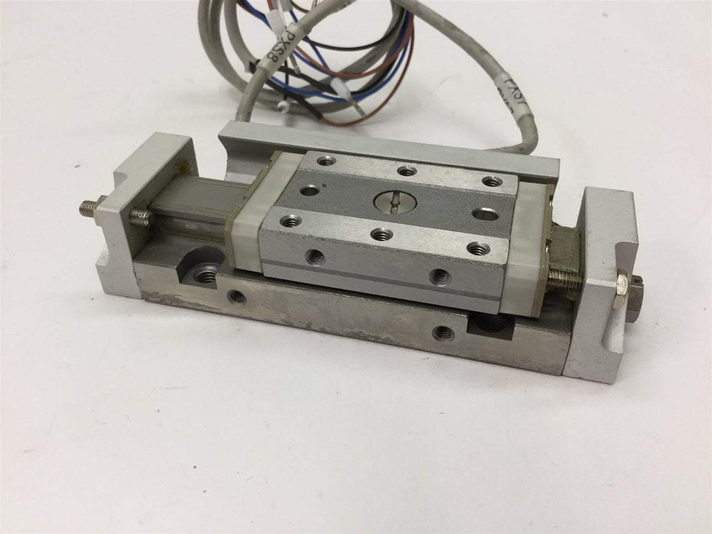 Used SMC MXP10-20 Pneumatic Slide Table, Stroke: 20mm, Bore: 10mm, 2x D-M9P Sensors