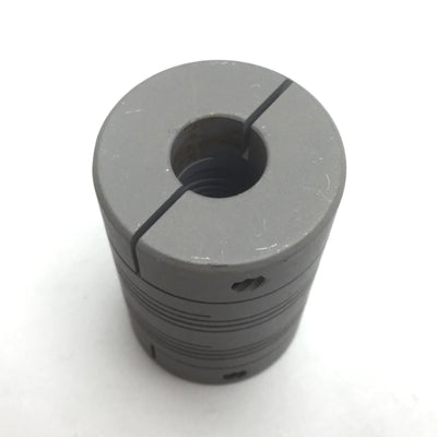 Used Flexible Shaft Coupling, Inside Diameters: 0.375" x 0.375", Length: 1.5", OD: 1"