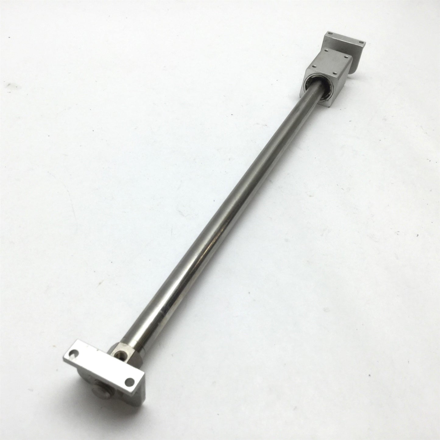 Used SMC NCY2B10H-1000 Rodless Cylinder, Bore: 3/8", Stroke: 10", With Brackets