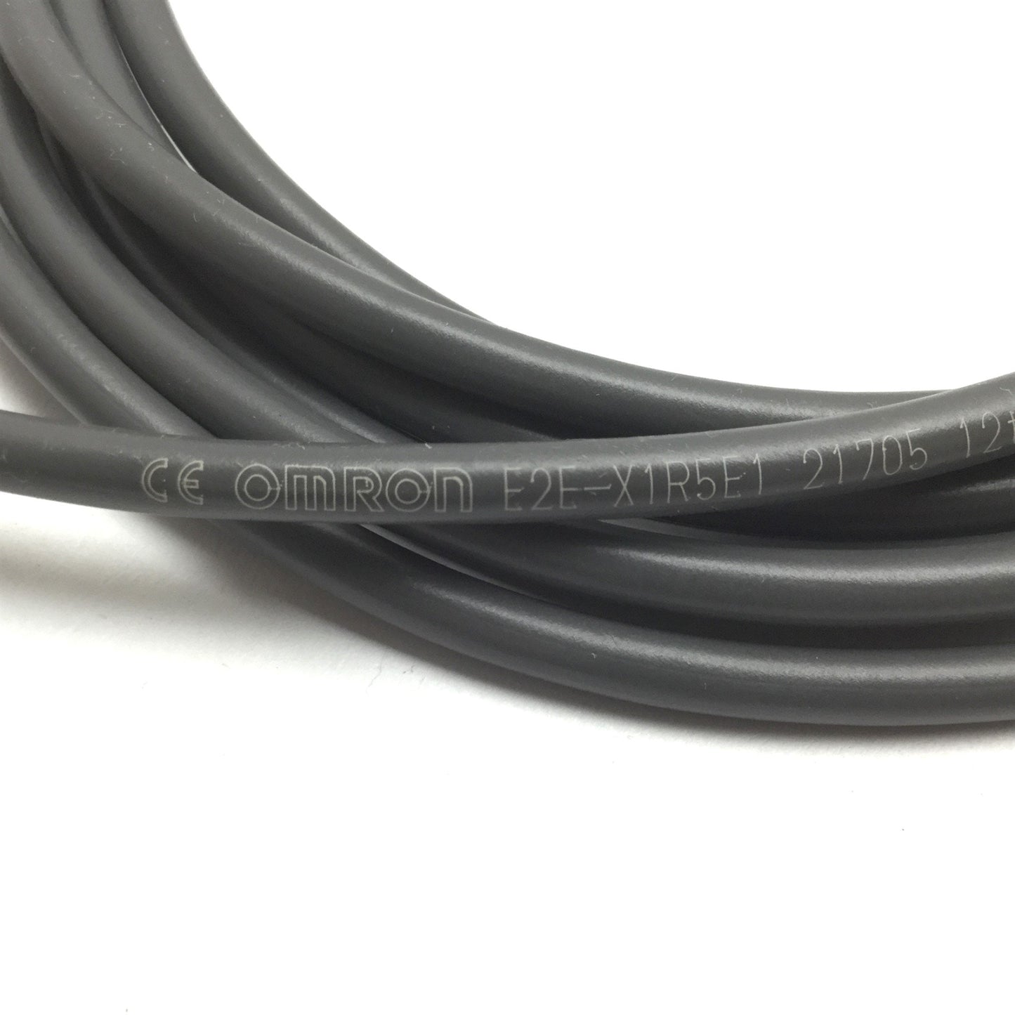 New Other Omron E2E-X1R5E1 Proximity Sensor, Range: 1.5mm, Barrel: M8, 12-24VDC, NPN