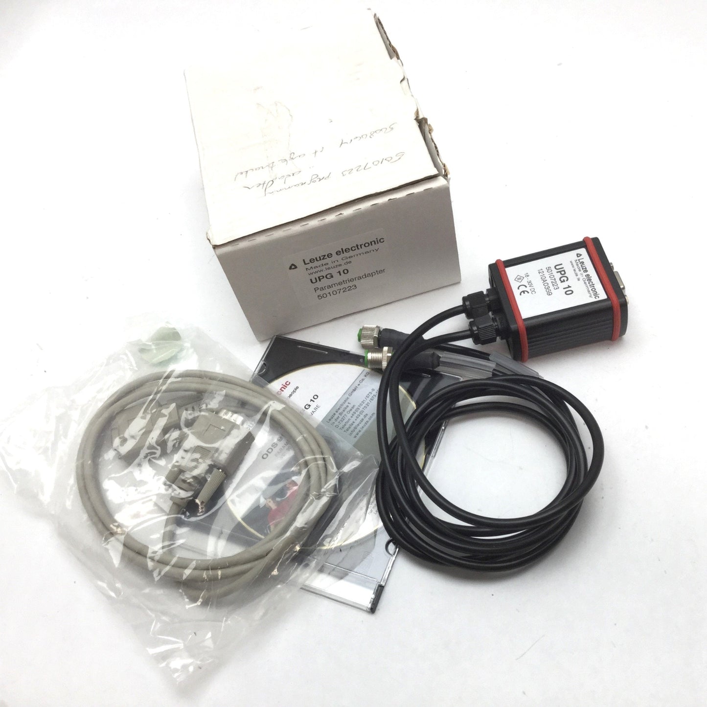 New Other Leuze Electronic UPG 10 Configuration Adapter, Power: 18-30VDC, RS-232 Female