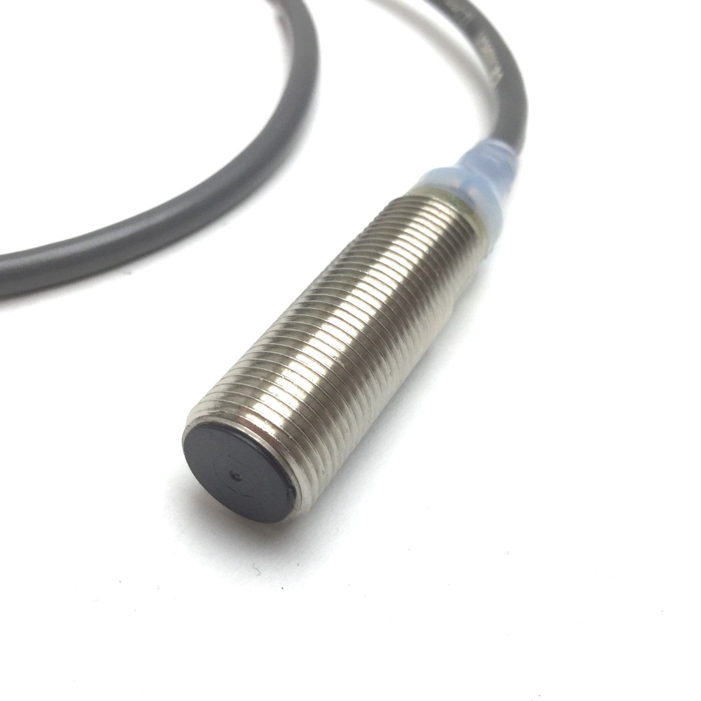 Used Omron E2A-M12KS02-WP-C1 Proximity Sensor, Range: 2mm, 12-24VDC, NPN N/O, M12