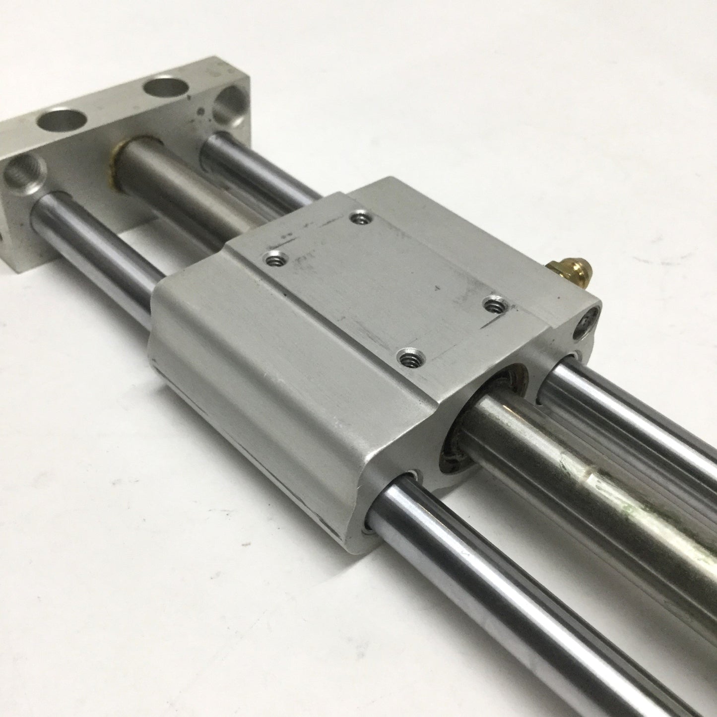 Used Bimba UGS-014.125-S Hydraulic Rodless Slide Cylinder 4.125" Stroke, 7/16" Bore