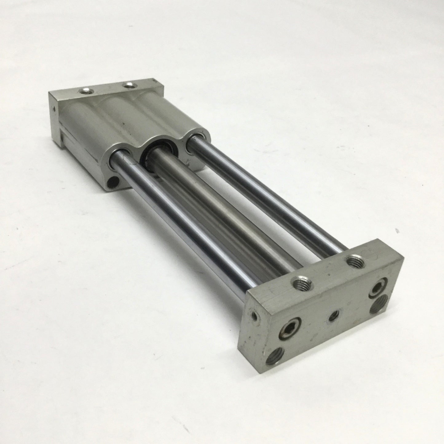 Used Bimba UGS-014.125-S Hydraulic Rodless Slide Cylinder 4.125" Stroke, 7/16" Bore