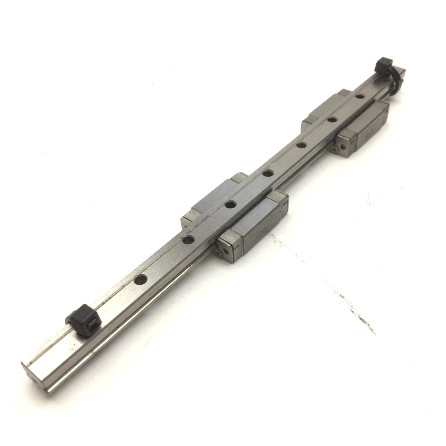 Used Bank of 2 IKO LWL7 B Ball Bearing Carriages on 140mm Rail, Carriage: 17mm x 23mm
