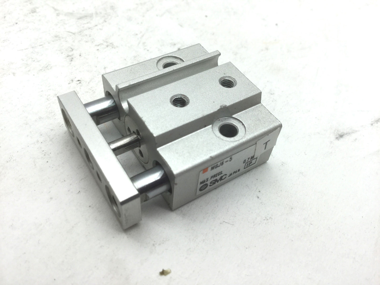 Used SMC MGJ6-5 Miniature Guide Rod Cylinder 5mm Stroke, 6mm Bore