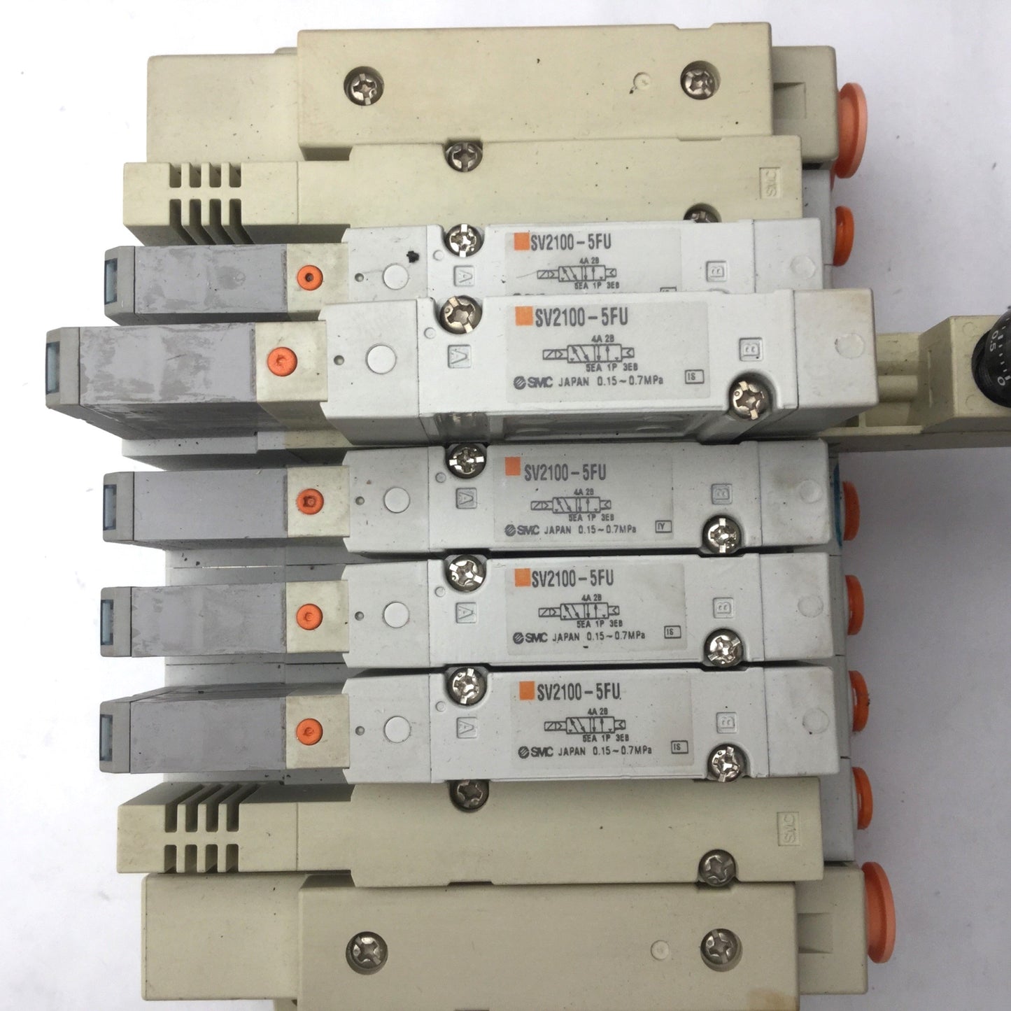 Used Bank of 5 SMC SV2100-5FU Solenoid Valves, 5-Port, 2-Position *Broken Connection*