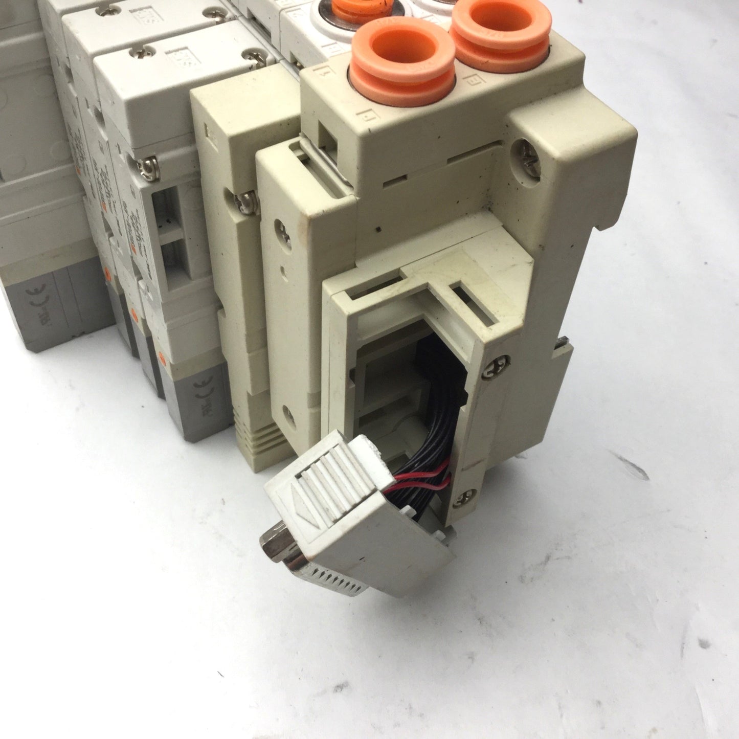 Used Bank of 5 SMC SV2100-5FU Solenoid Valves, 5-Port, 2-Position *Broken Connection*