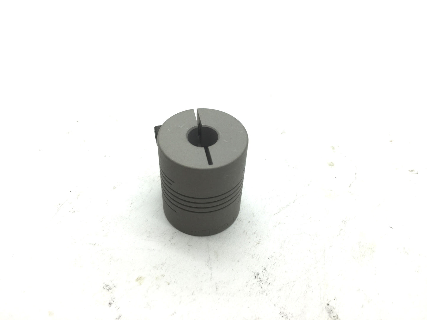 Used Flexible Shaft Clamping Coupling, 1/4" ID, OD: 3/4", Length: 1"