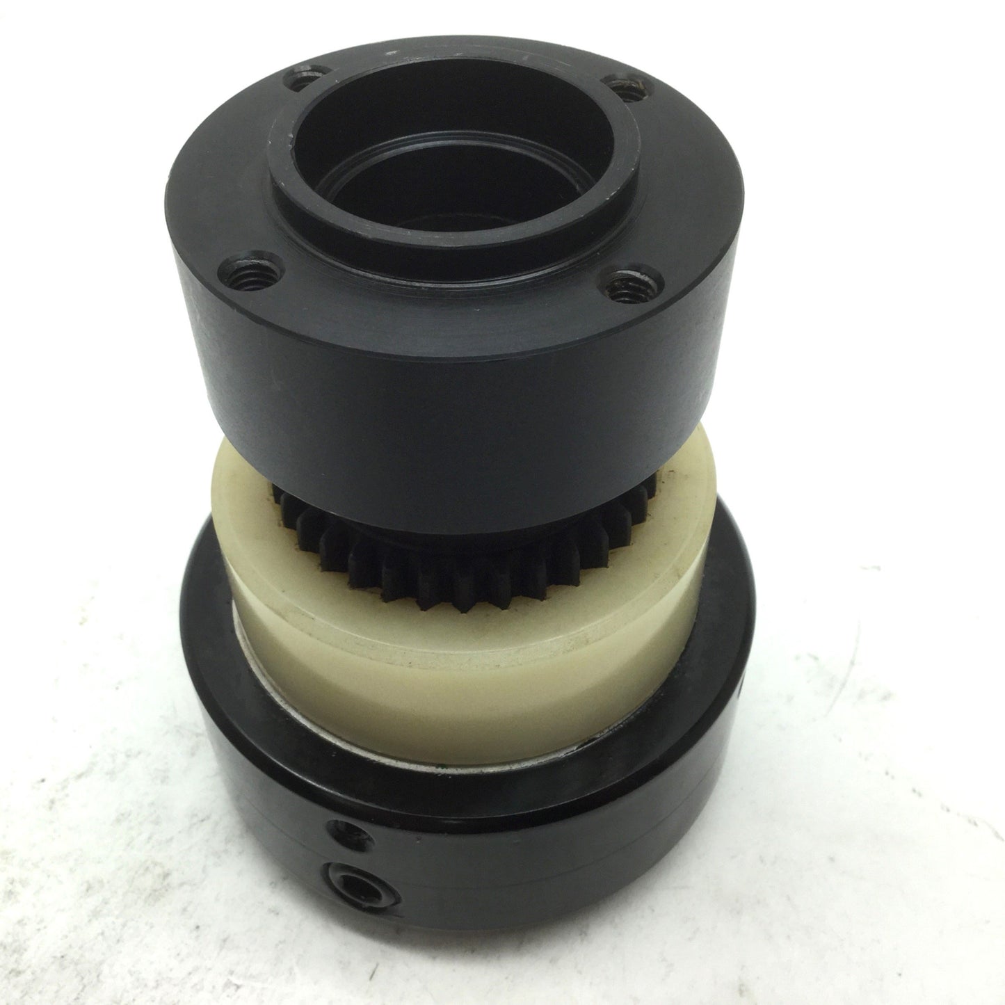 New – Open box Bowex M-28 Curved Tooth Coupling 16.8mm Bore to 64.6mm Flange M6-1.0