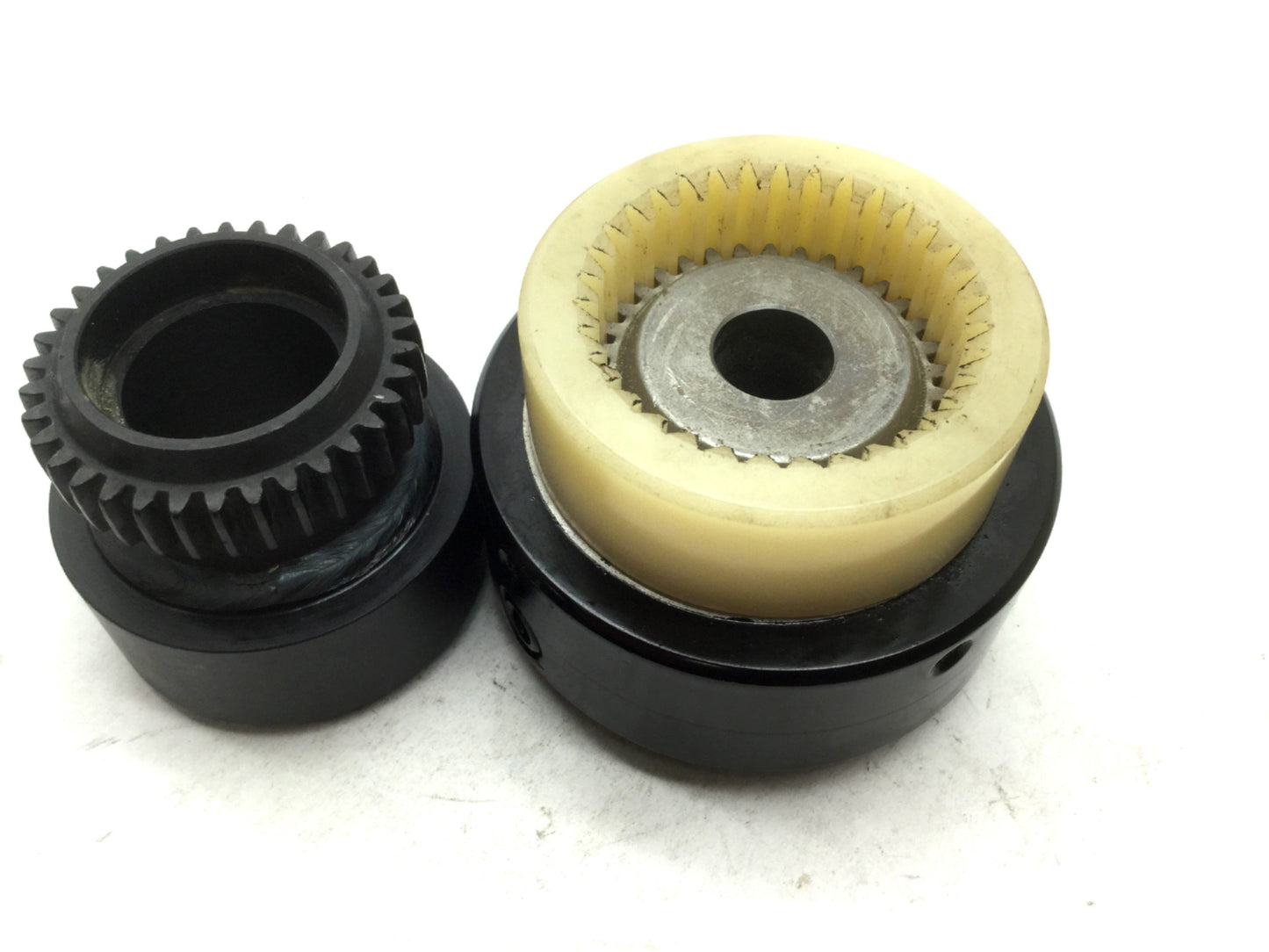New – Open box Bowex M-28 Curved Tooth Coupling 16.8mm Bore to 64.6mm Flange M6-1.0
