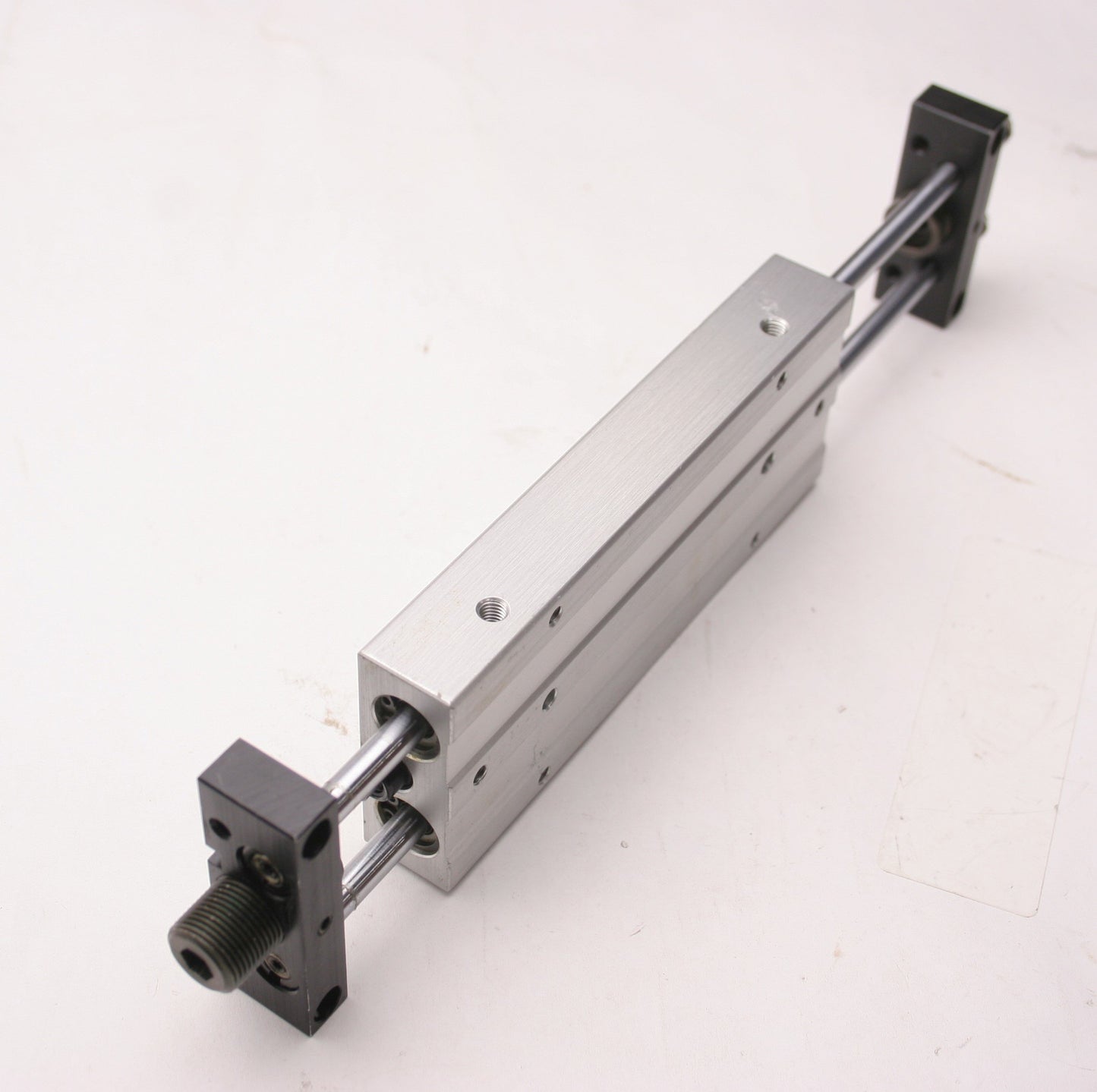 Used CKD UCA2-L-Y-10-75 P2 Pneumatic Guided Cylinder, 3" Stroke, 10/32-M5x0.8 Ports