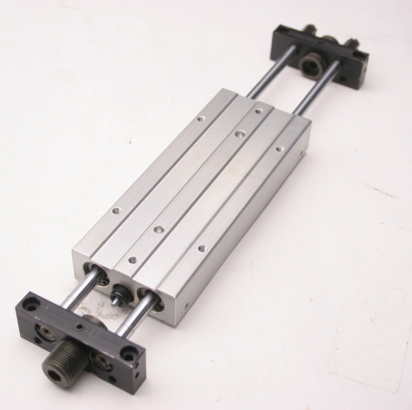 Used CKD UCA2-L-Y-10-75 P2 Pneumatic Guided Cylinder, 3" Stroke, 10/32-M5x0.8 Ports