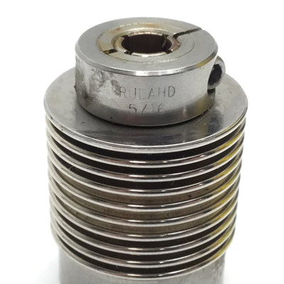 Used Ruland 6mm to 9.3mm Flexible Shaft Coupling, Overall 35mm Long x 25.5mm Diameter