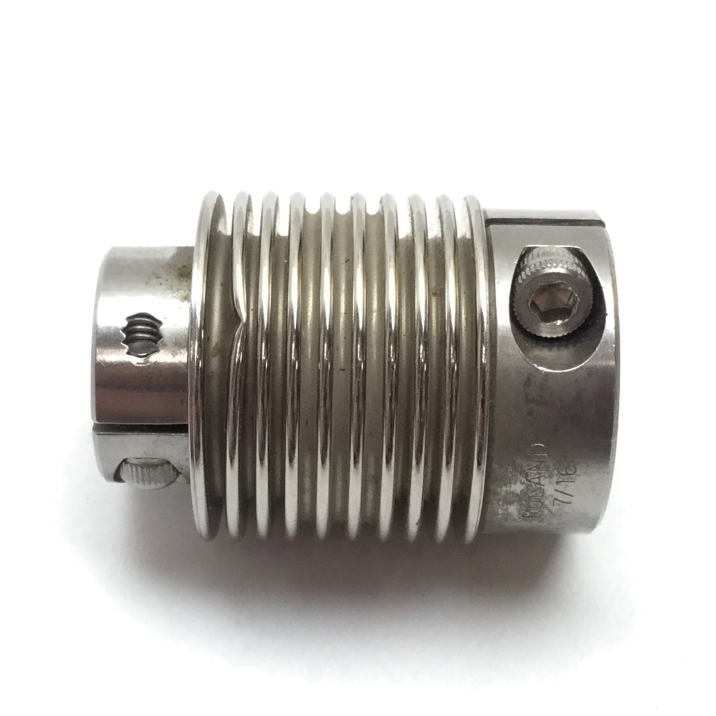 Used Ruland 6mm to 9.3mm Flexible Shaft Coupling, Overall 35mm Long x 25.5mm Diameter