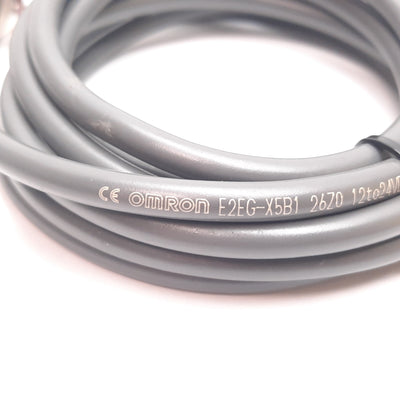 Used Omron E2EG-X5B1 Inductive Proximity Sensor, 5mm, 12-24VDC, PNP N/O, M18, 2m