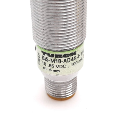 Used Turck Bi5-M18-AD4X-H1141 Inductive Proximity Sensor, 5mm, 10-65VDC, M12 4-Pin