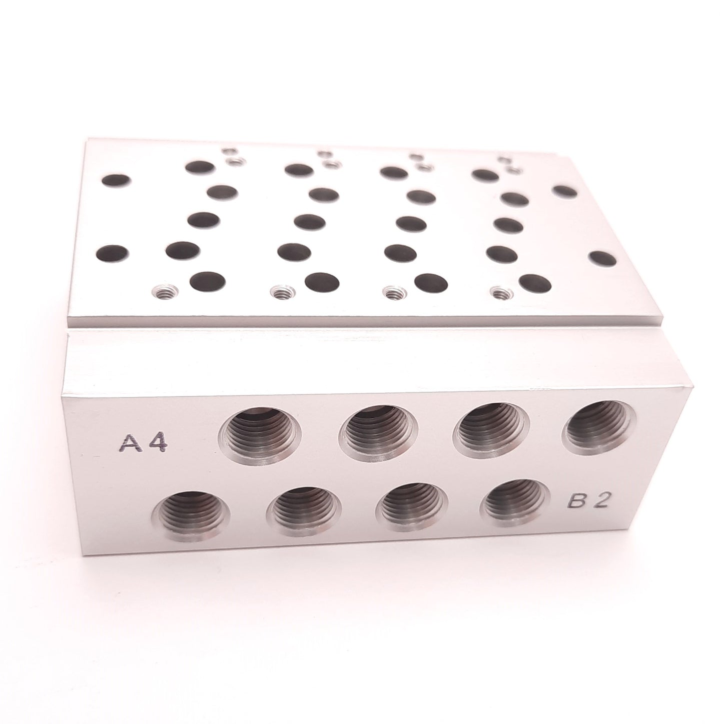 New – Open box SMC SS5Y5-41-04-01T-Q Base Mounted Bar Stock Manifold, 4 Stations, 1/8 NPT