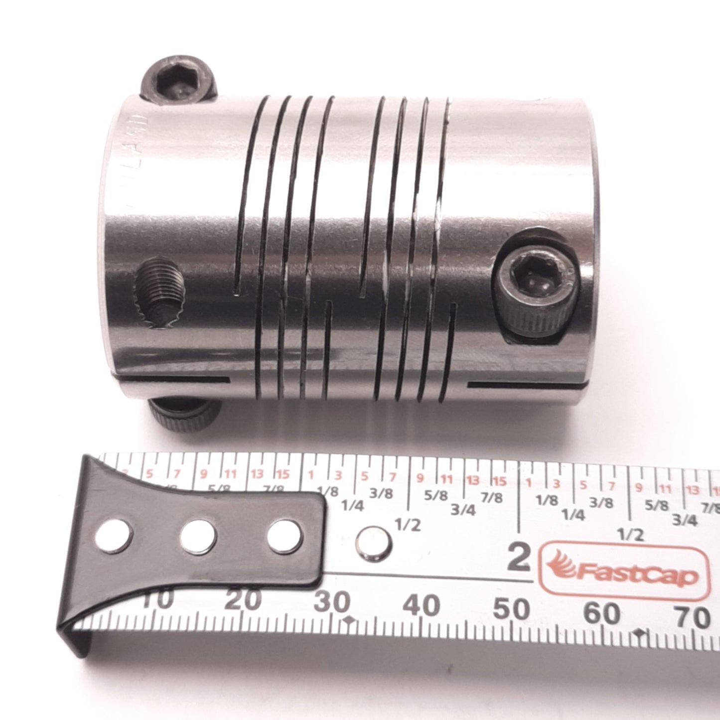 Used Ruland FCR24-15mm-1/2"-SS Rigid Servo Beam Coupler 15mm and 1/2" Couples