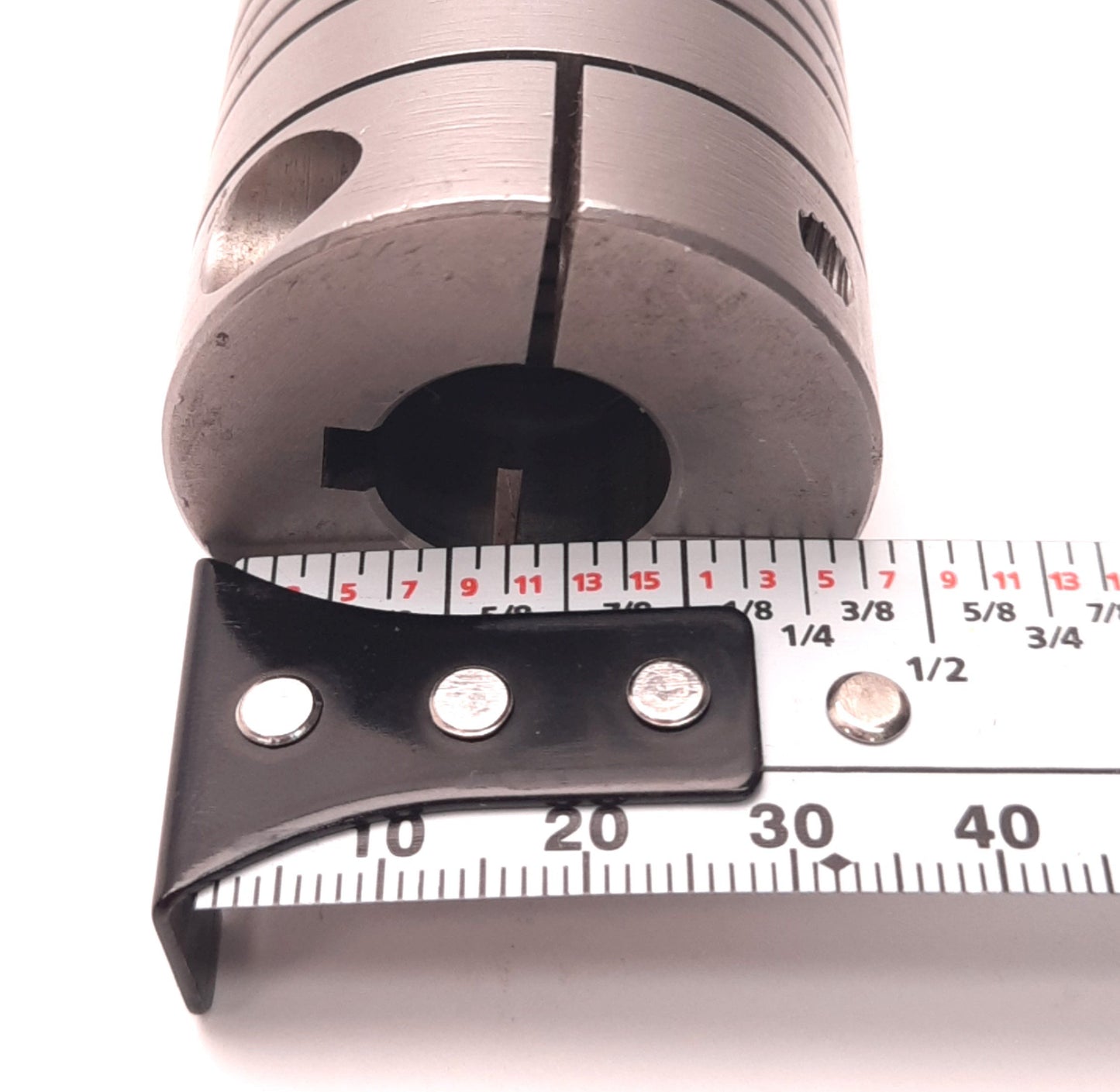 Used Helical MC7150-20-12 Flexible Stainless Steel Coupling, 0.625" x 0.375" Bores