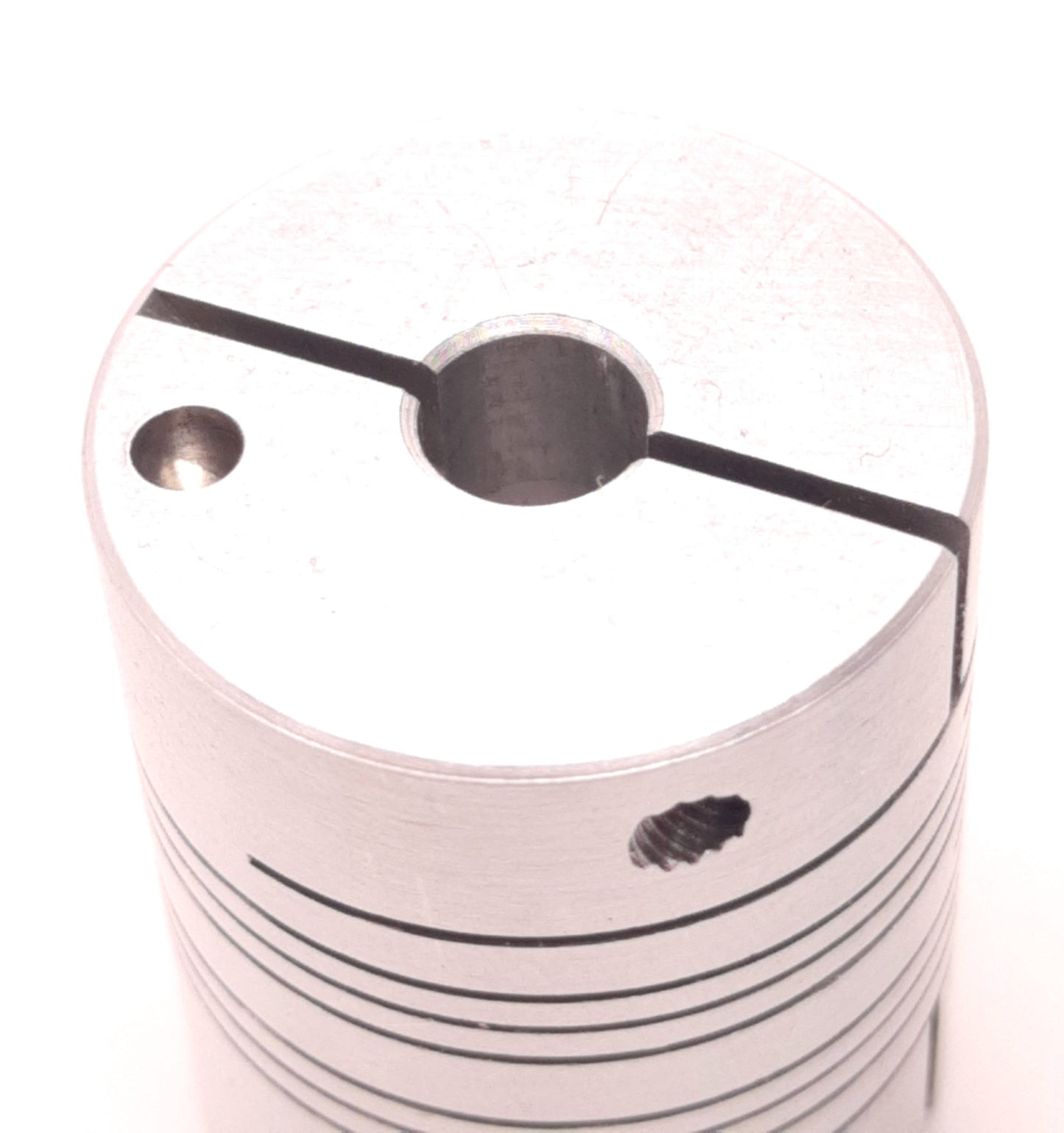 Used Ruland MWC25-8MM-1/4"-A Beam Coupling 8mm & 1/4" Bore, 25mm OD, 30mm Length