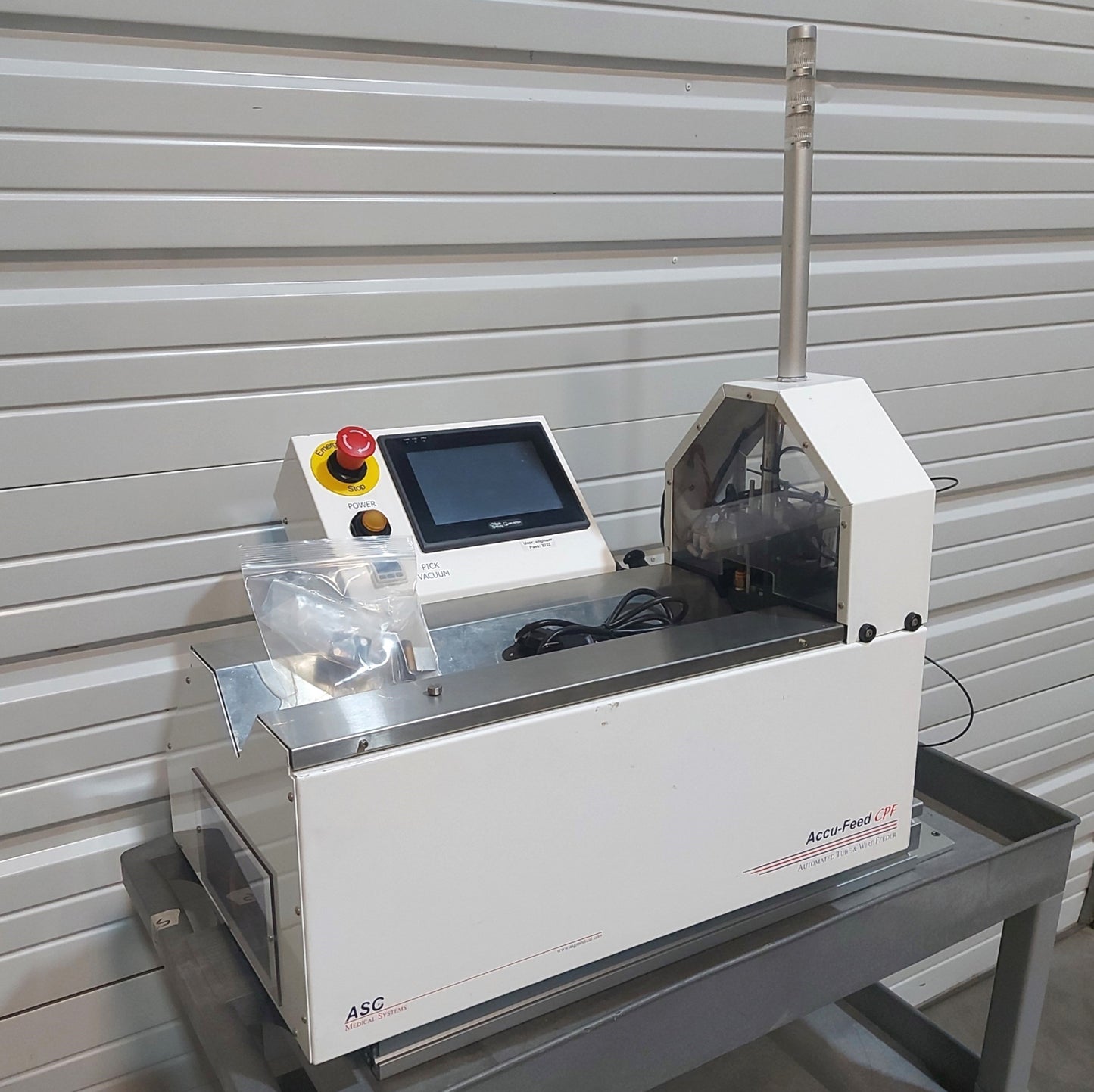 Used ASC Medical Systems Accu-Feed CPF Center Pick Feeder 1Part/4sec 24"/sec 120VAC