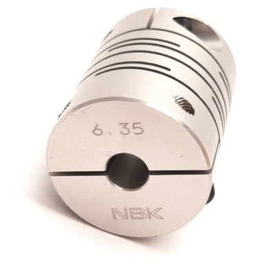 Used NBK MST-25C-6.35-8 Flexible Coupling, 6.35mm (1/4") to 8mm, 25mm OD, 31mm Long