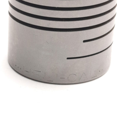 Used Helical HCR112-12-8 Flexible Coupling, 3/8" x 1/4" Bores, 1.5" length, 1.125" OD