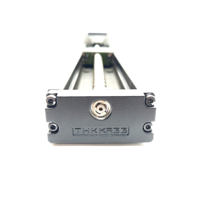 Used THK KR3310C-0235-P Linear Positioner, 10mm Lead, 235mm Travel, NEMA 23