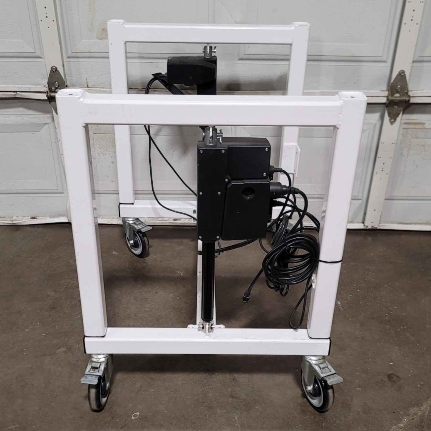 Used LTW E2 Ergonomic Adjustable Height Industrial Machine Base 24"W x 30"D, 12" Lift