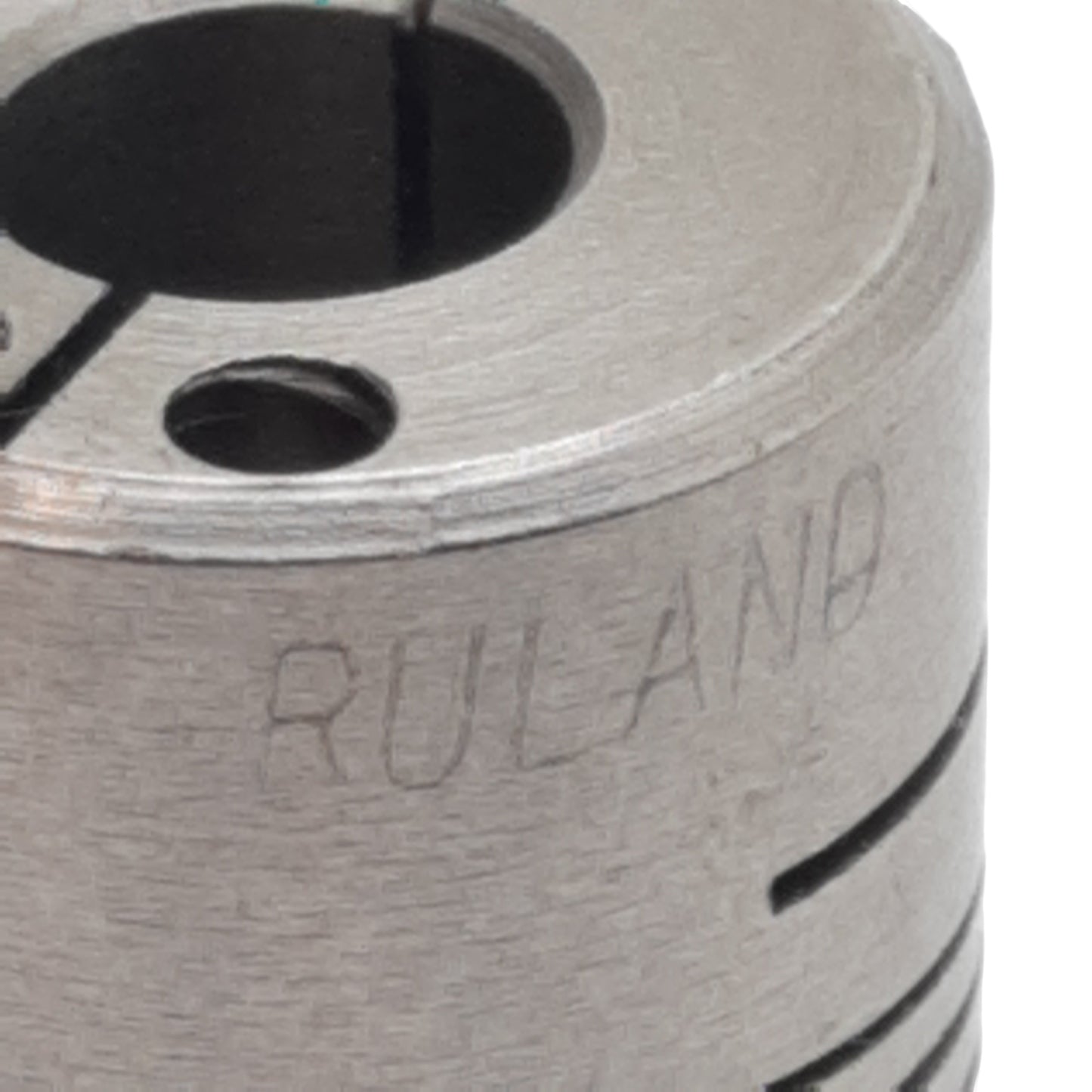Used Ruland FCR12-5-3-SS Steel Shaft Coupling 0.3125"x0.1875" Bore, 1.25" L, 0.75" OD