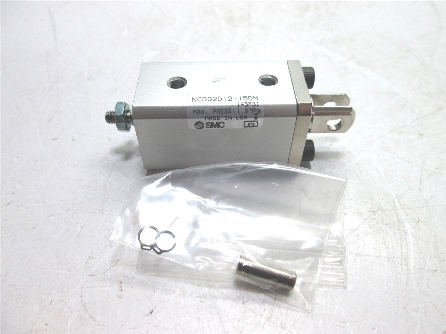 New SMC NCDQ2D12-15DM Compact Cylinder, Bore: 12mm, Stroke: 15mm, Ports: M5