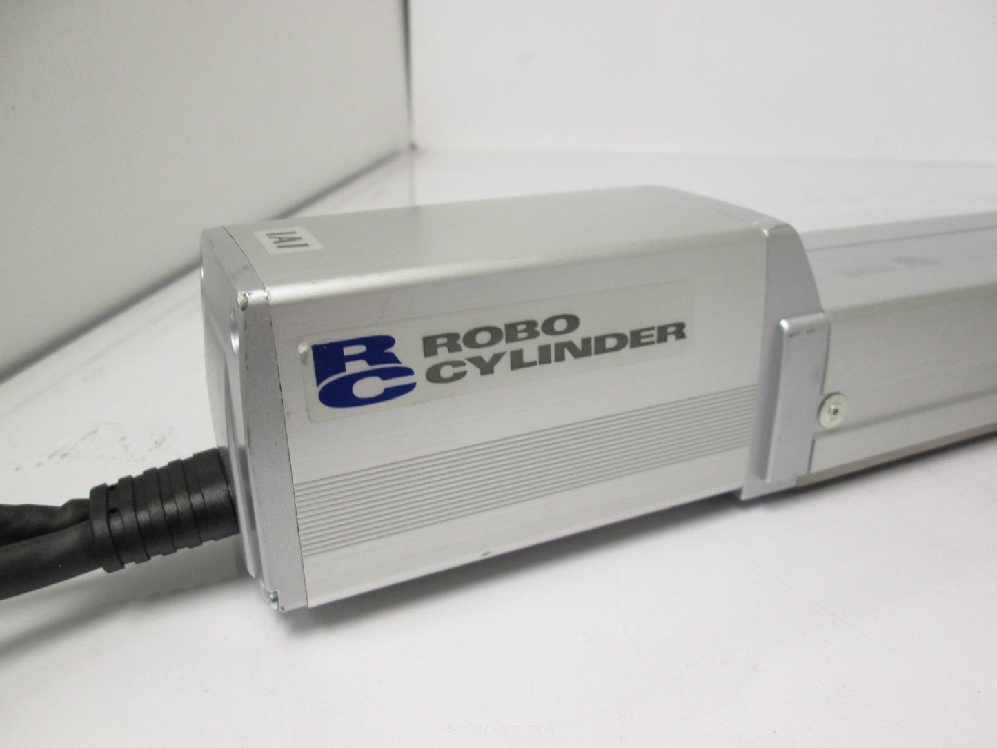 Used IAI RCP2-SS-I-PM-6-600-P1-P Slider w/ Iron Base 600mm Stroke *Dent in Cover*