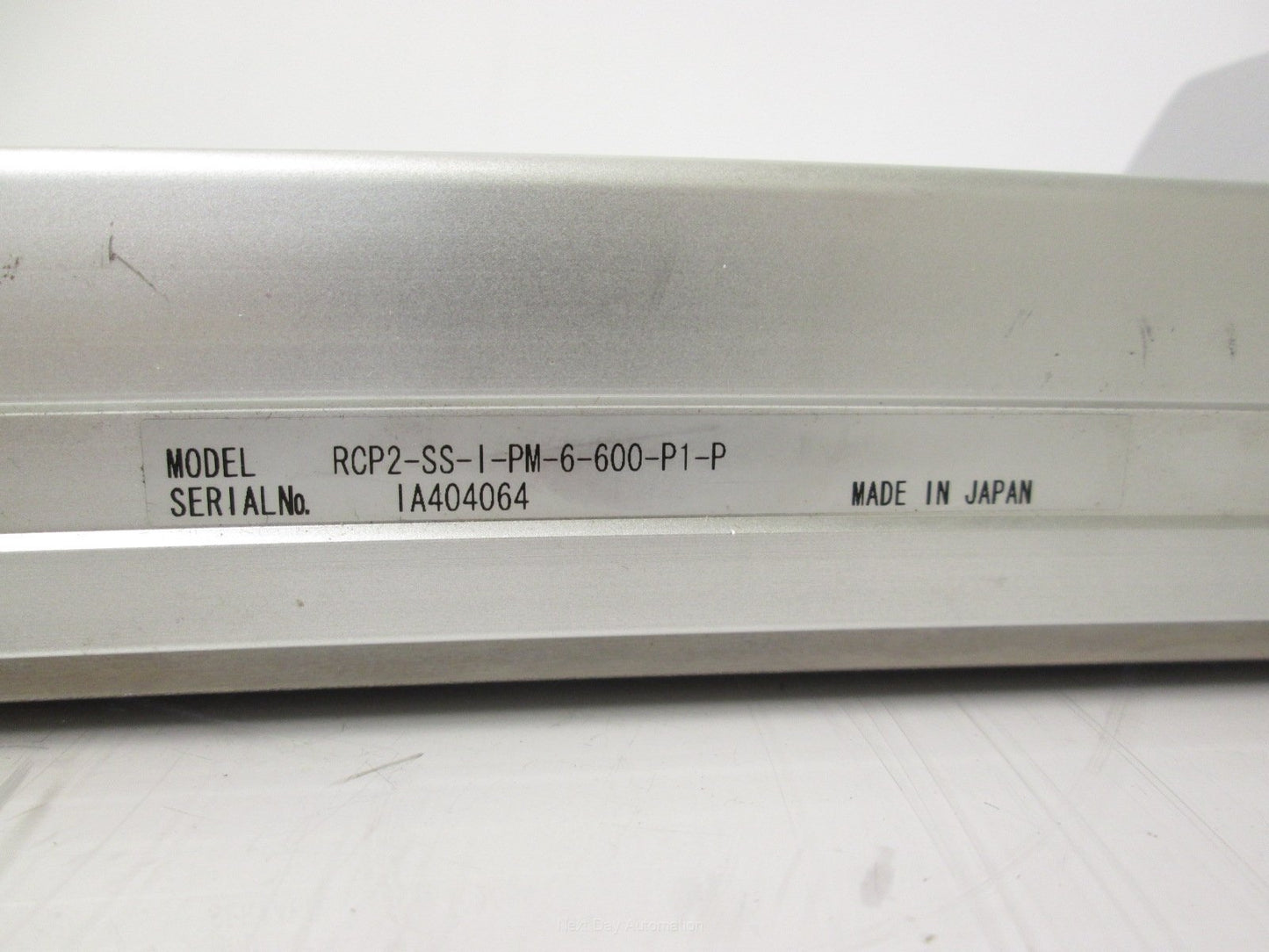 Used IAI RCP2-SS-I-PM-6-600-P1-P Slider w/ Iron Base 600mm Stroke *Dent in Cover*