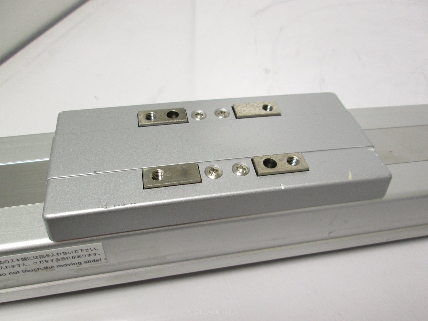 Used IAI RCP2-SS-I-PM-6-600-P1-P Slider w/ Iron Base 600mm Stroke *Dent in Cover*