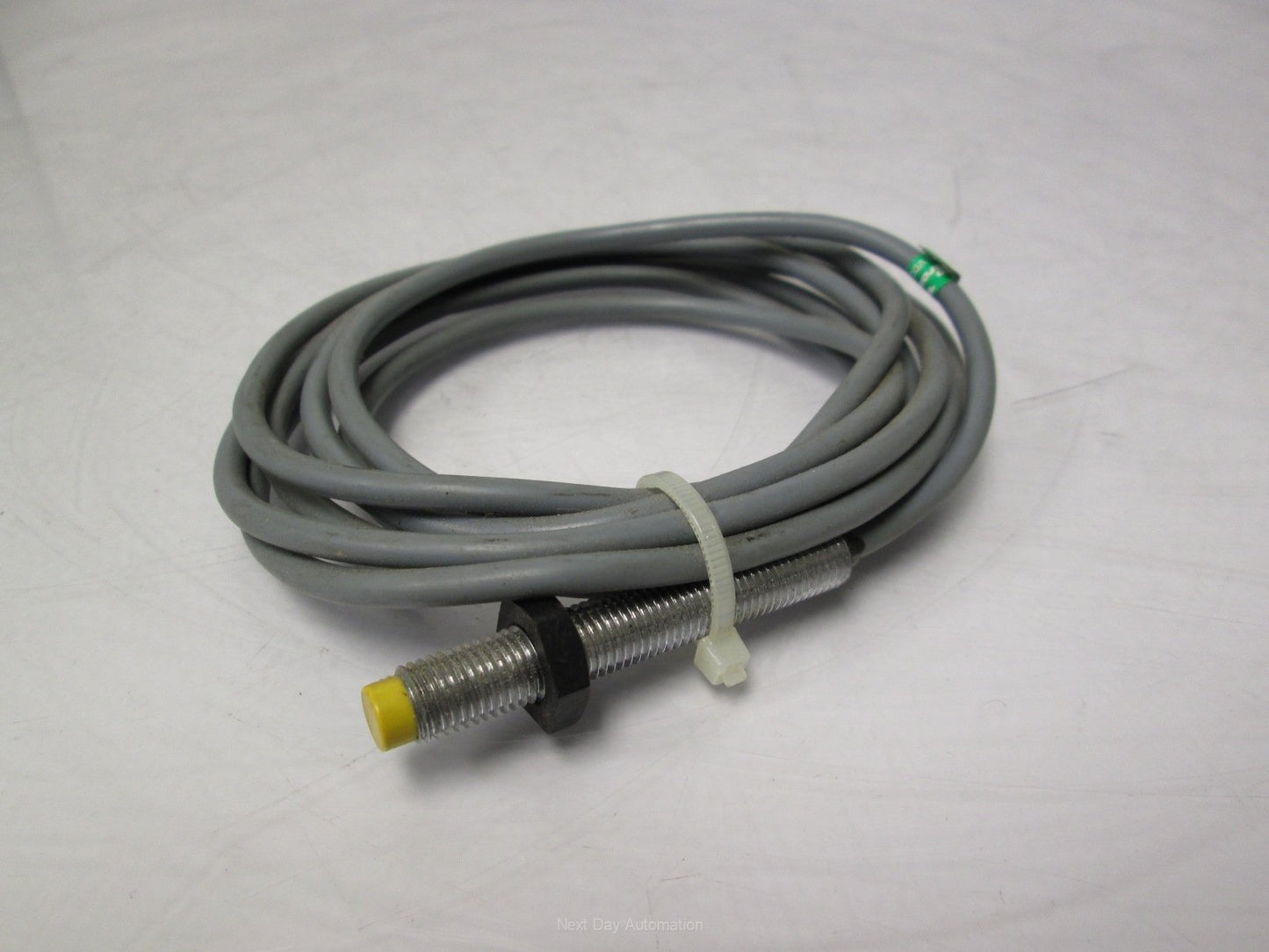 Used Turck Ni2-G08-AN6X Proximity Sensor 10-30VDC 2mm Range NPN NO 8mm Barrel w/Cable