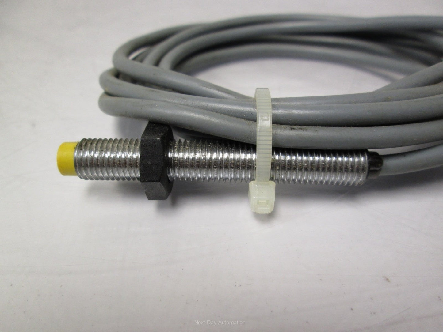 Used Turck Ni2-G08-AN6X Proximity Sensor 10-30VDC 2mm Range NPN NO 8mm Barrel w/Cable