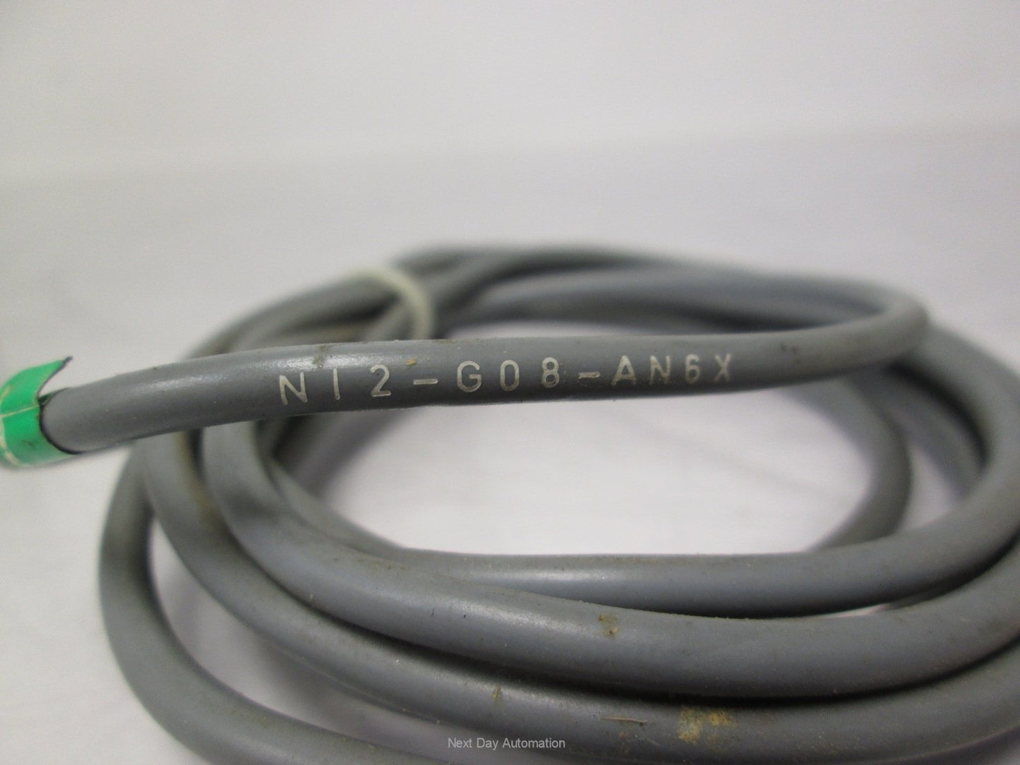 Used Turck Ni2-G08-AN6X Proximity Sensor 10-30VDC 2mm Range NPN NO 8mm Barrel w/Cable