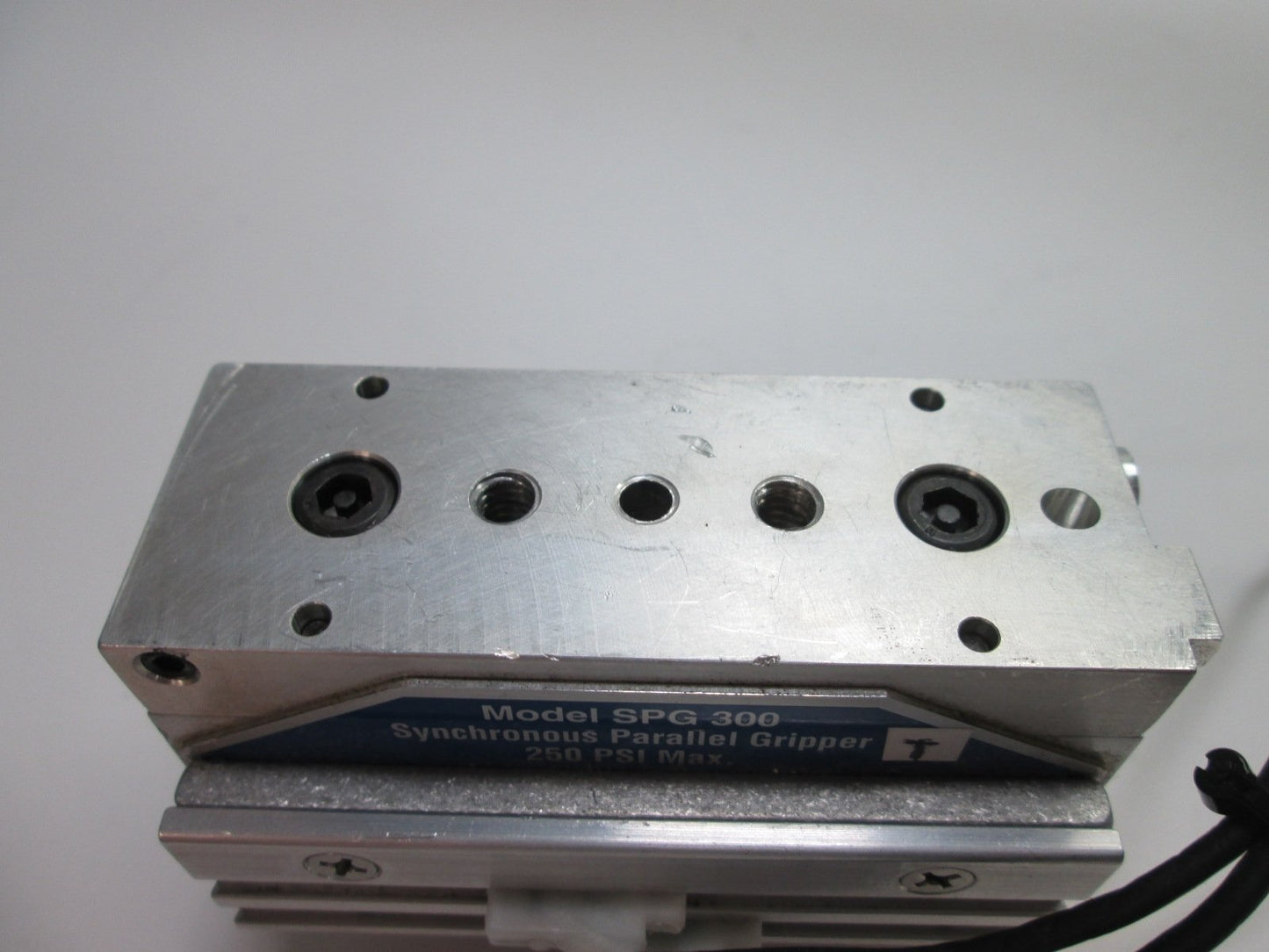 Used Fabco-Air SPG300-J2-E24C-A-V Parallel Gripper, 22 lbf, 0.54" Stroke, w/ Sensors