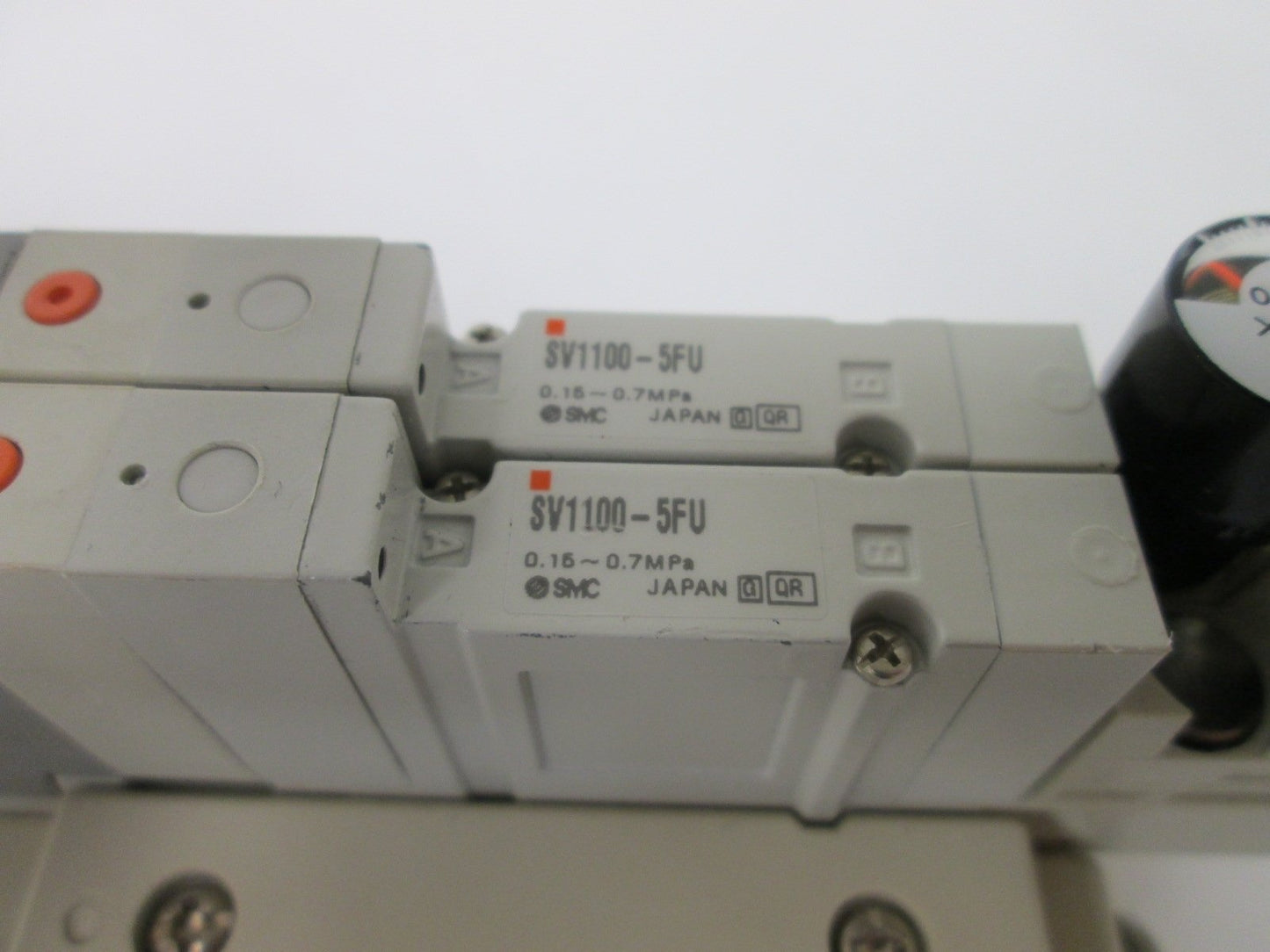 Used Manifold of 2 SMC SV1100-5FU Pneumatic Solenoid Valves, Pressure: 0.15-0.7MPa