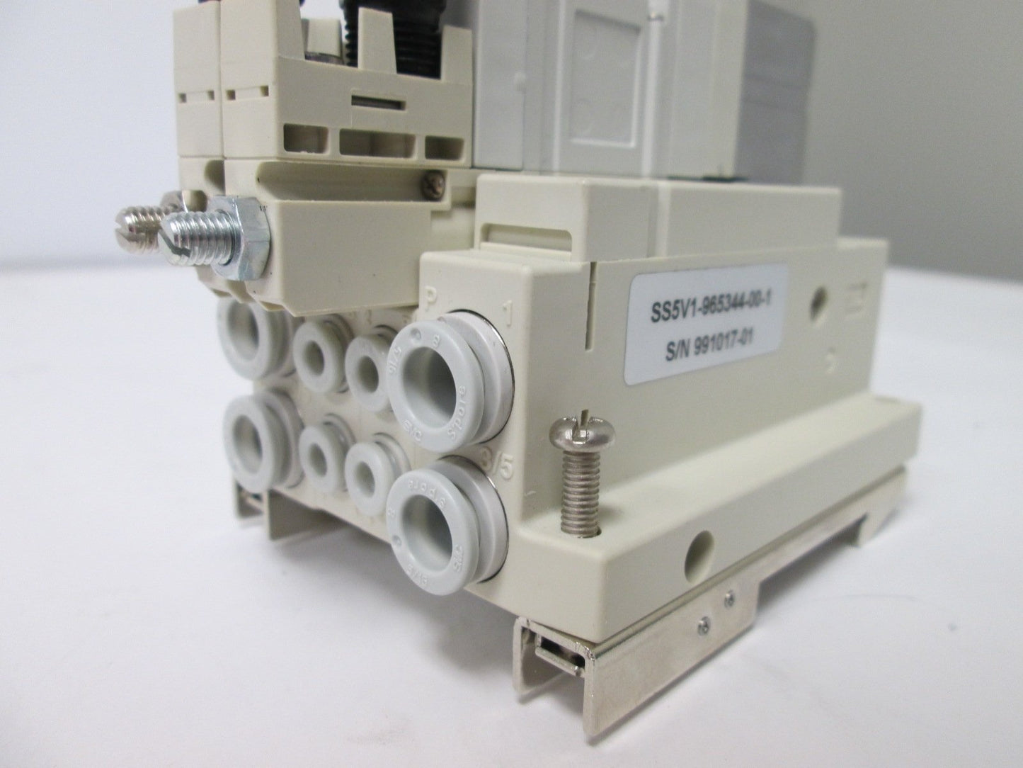 Used Manifold of 2 SMC SV1100-5FU Pneumatic Solenoid Valves, Pressure: 0.15-0.7MPa