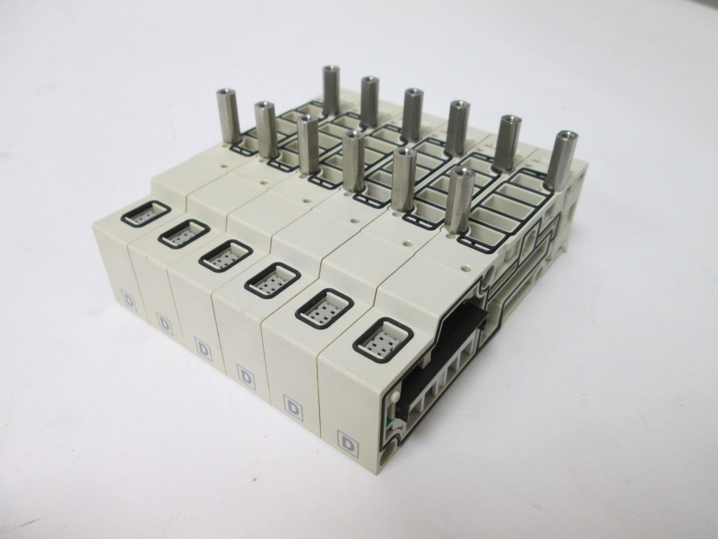 Used Bank of 6 SMC SV2000-50-1A-N7 Manifold Blocks, Voltage Rating: 12/24VDC