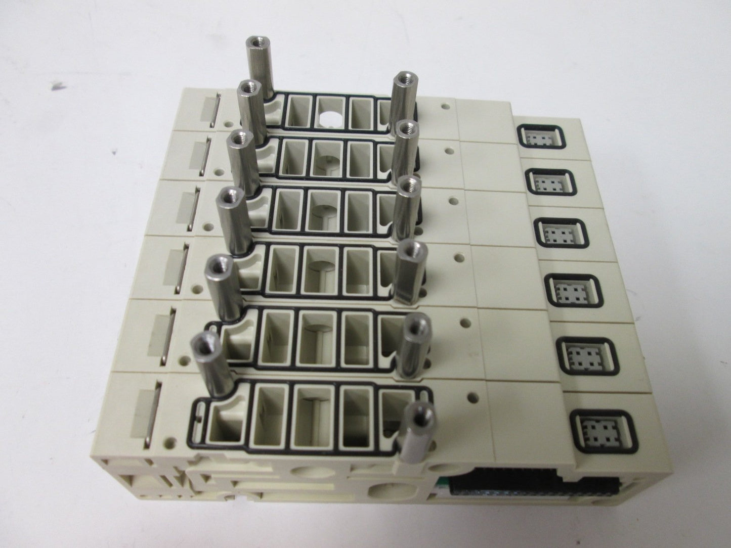 Used Bank of 6 SMC SV2000-50-1A-N7 Manifold Blocks, Voltage Rating: 12/24VDC