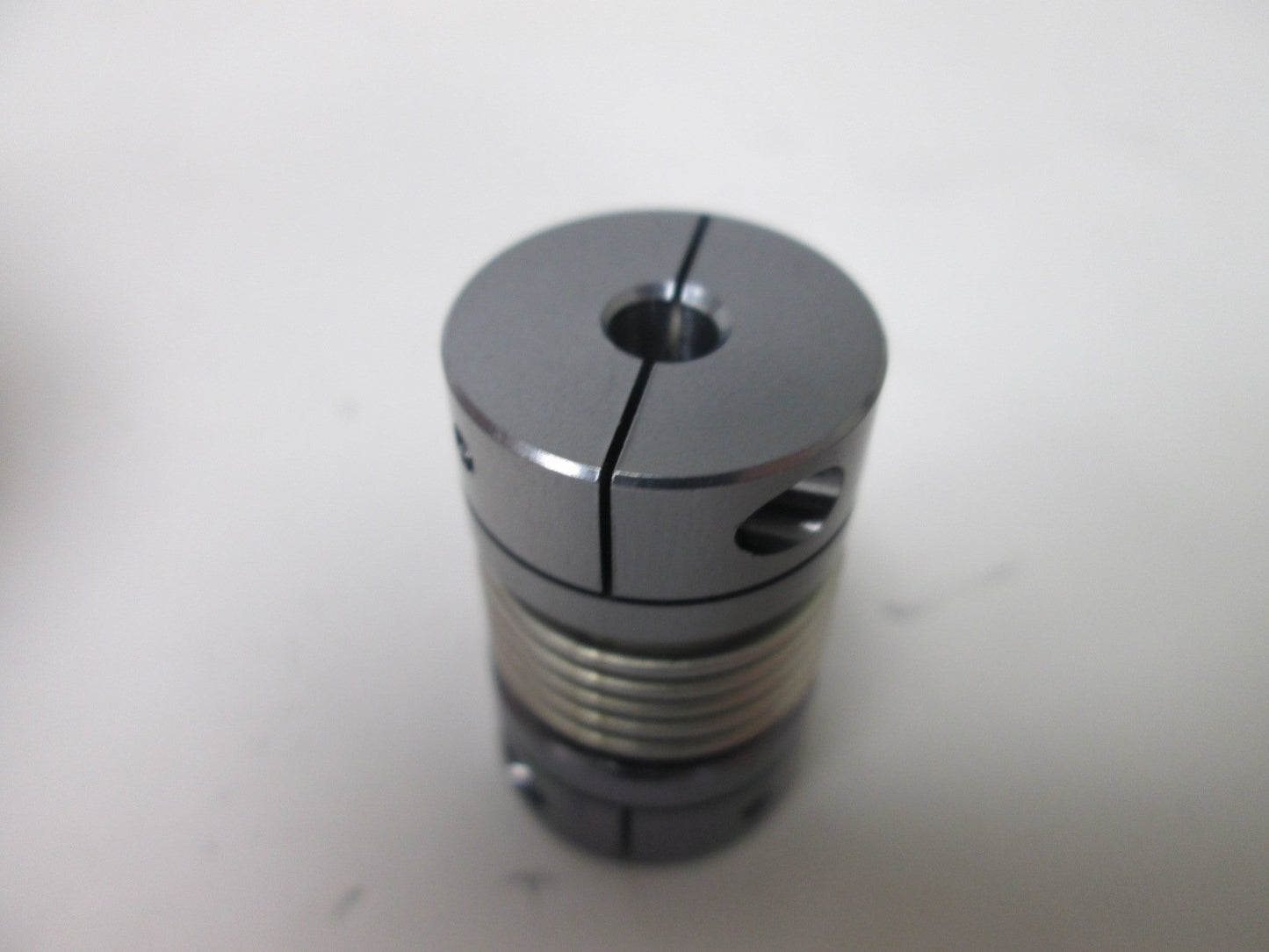 New Ruland BC12-4-3-A Bellows Coupling, Bore: 0.25" to 0.188", 0.75" OD x 1.18"