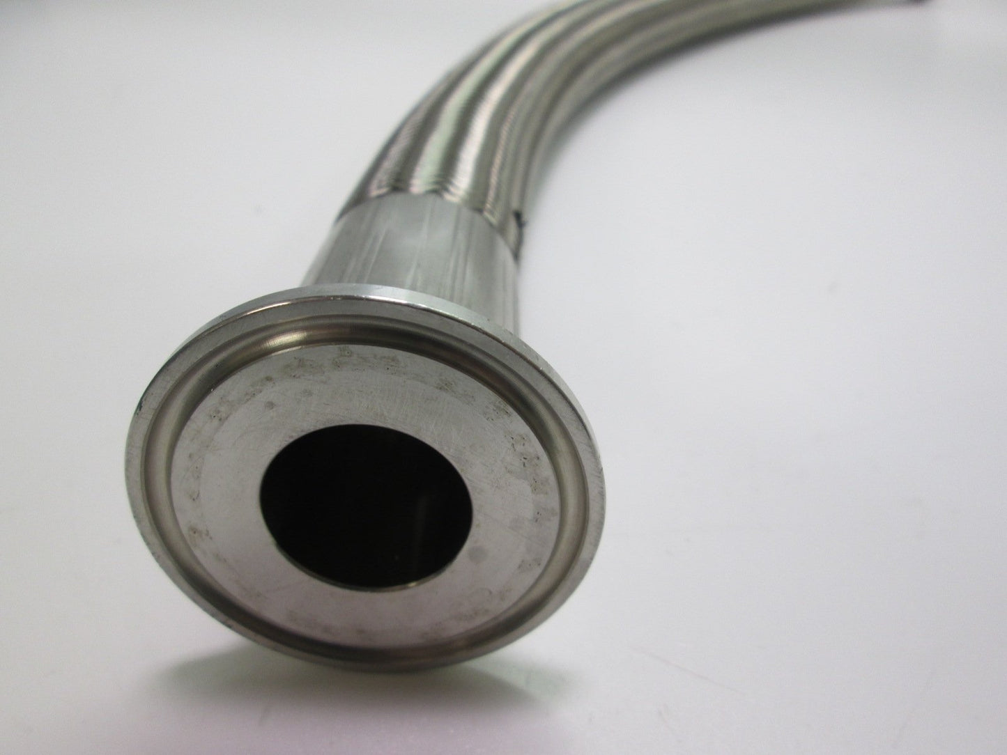 Used 24" Braided Stainless Steel Flexible Hose 1.31" OD W/ 1" Sanitary Fittings